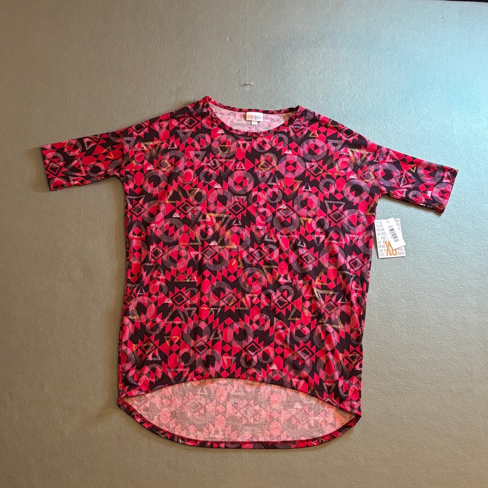 LuLaRoe Irma Tunic Top Pink Geometric Print‎ High Low Short Sleeve XS NWT